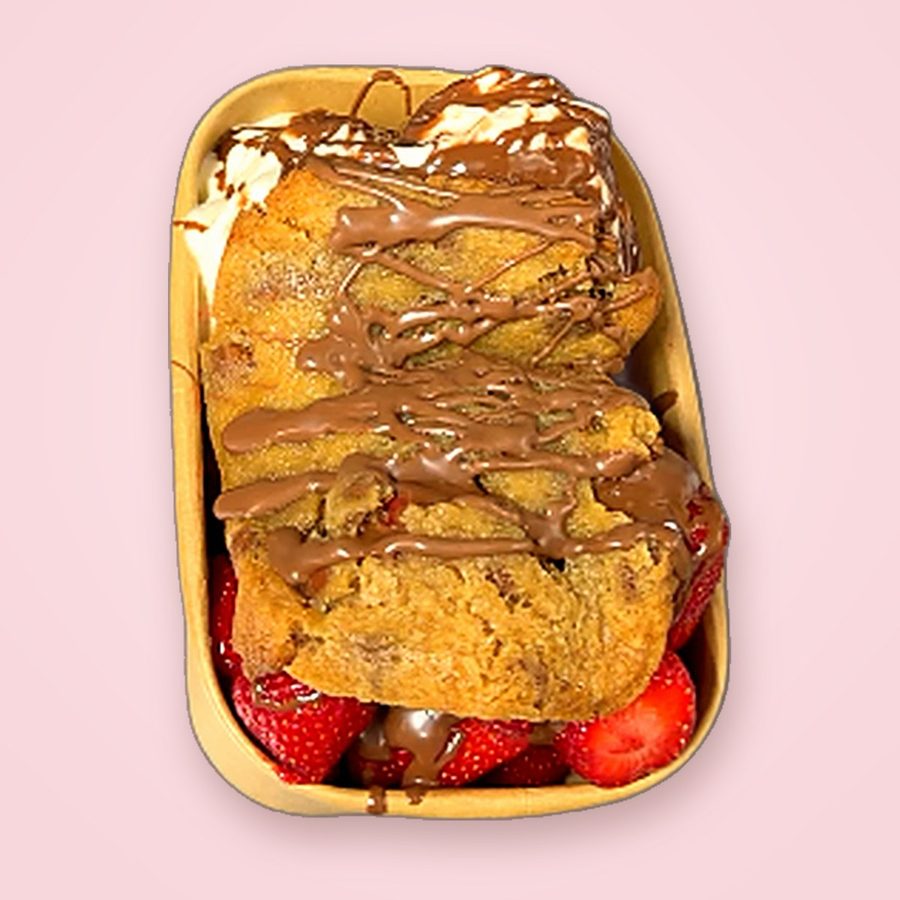 Hot cookie dough with strawberries, ice cream and Nutella sauce